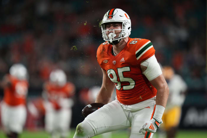 Nov 26, 2022; Miami Gardens, Florida, USA; Miami Hurricanes tight end Will Mallory (85) reacts after making a catch against the Pittsburgh Panthers during the first half at Hard Rock Stadium.